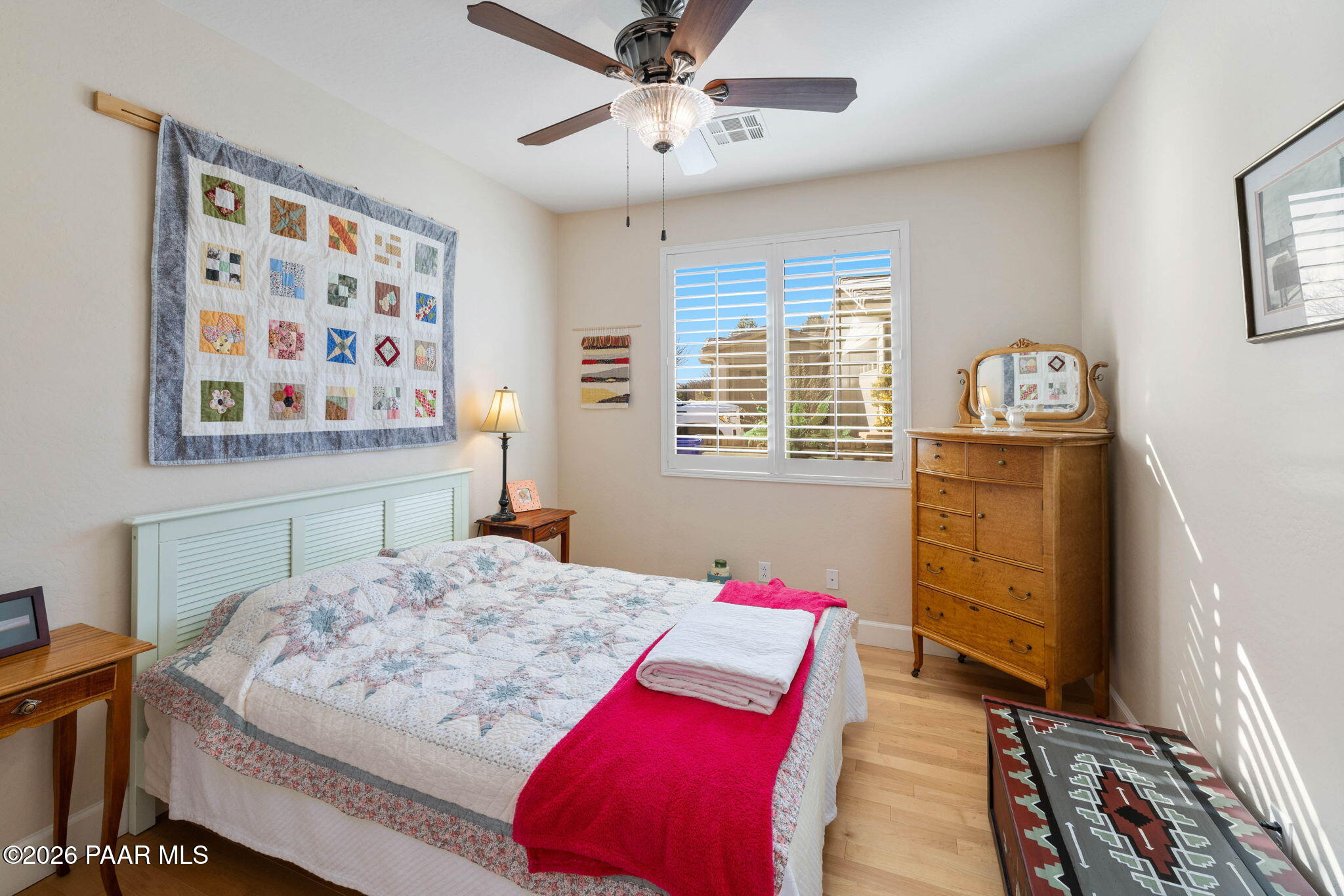 1636 Constable Street Prescott, AZ 86301 - Photo 26 of 41 a bedroom with a bed and a dresser in it