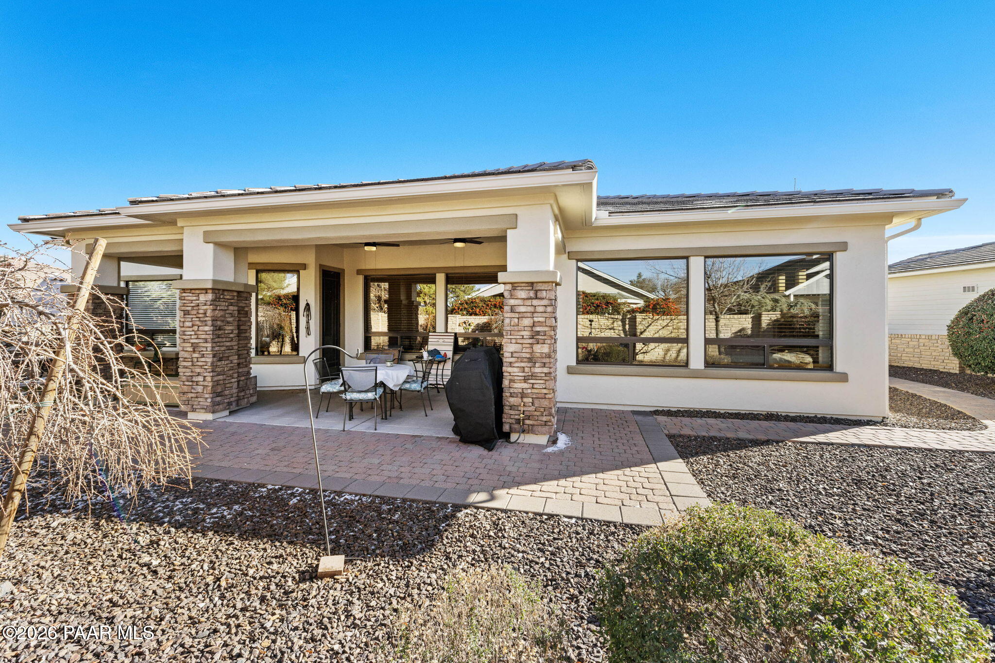 1636 Constable Street Prescott, AZ 86301 - Photo 35 of 41 a view of a porch with a table and chairs