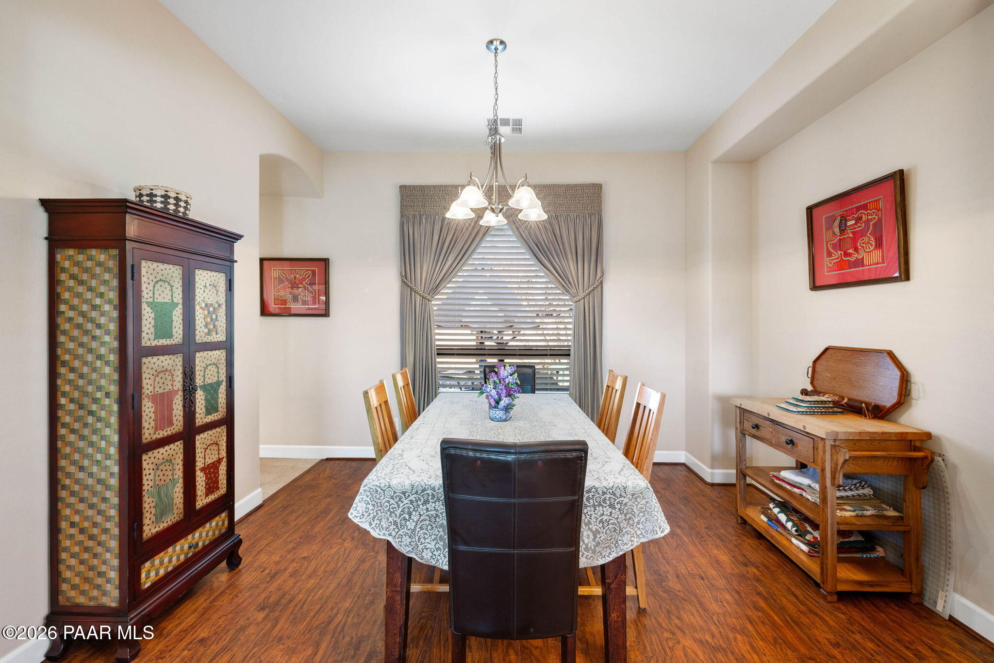 1636 Constable Street Prescott, AZ 86301 - Photo 10 of 41 a view of a dining room with furniture window and wooden floor
