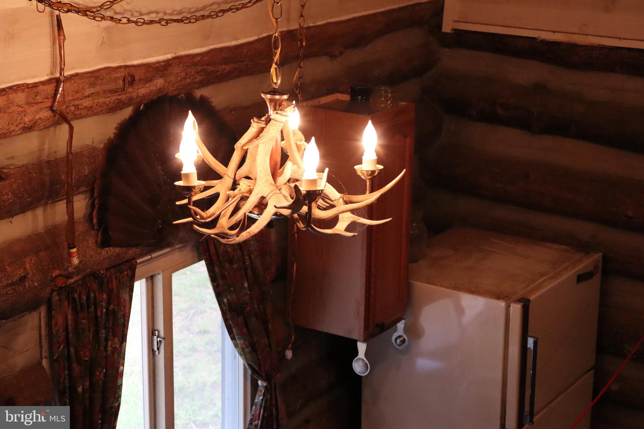 418 R R & R Ridge Road Brandywine, WV 26802 - Photo 16 of 43 a close up of a mirror