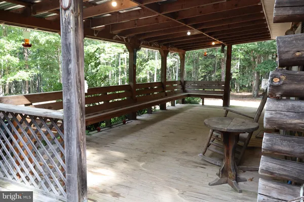 a view of a porch with furniture