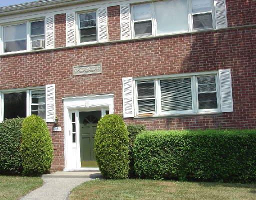 256 Glenbrook Road, Unit 41A Stamford, CT 06906 - Photo 1 of 1 a front view of a house with plants