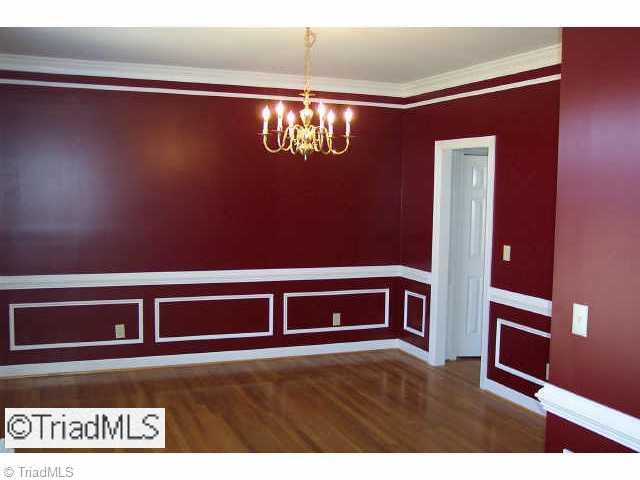Other. Elegant dining room with hard wood flooring