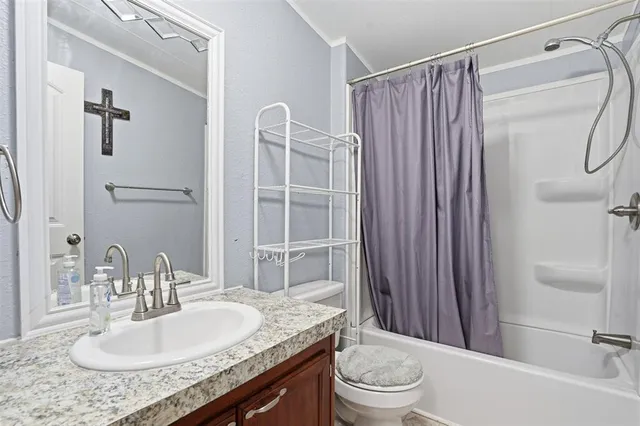 a work room with furniture and a chandelier