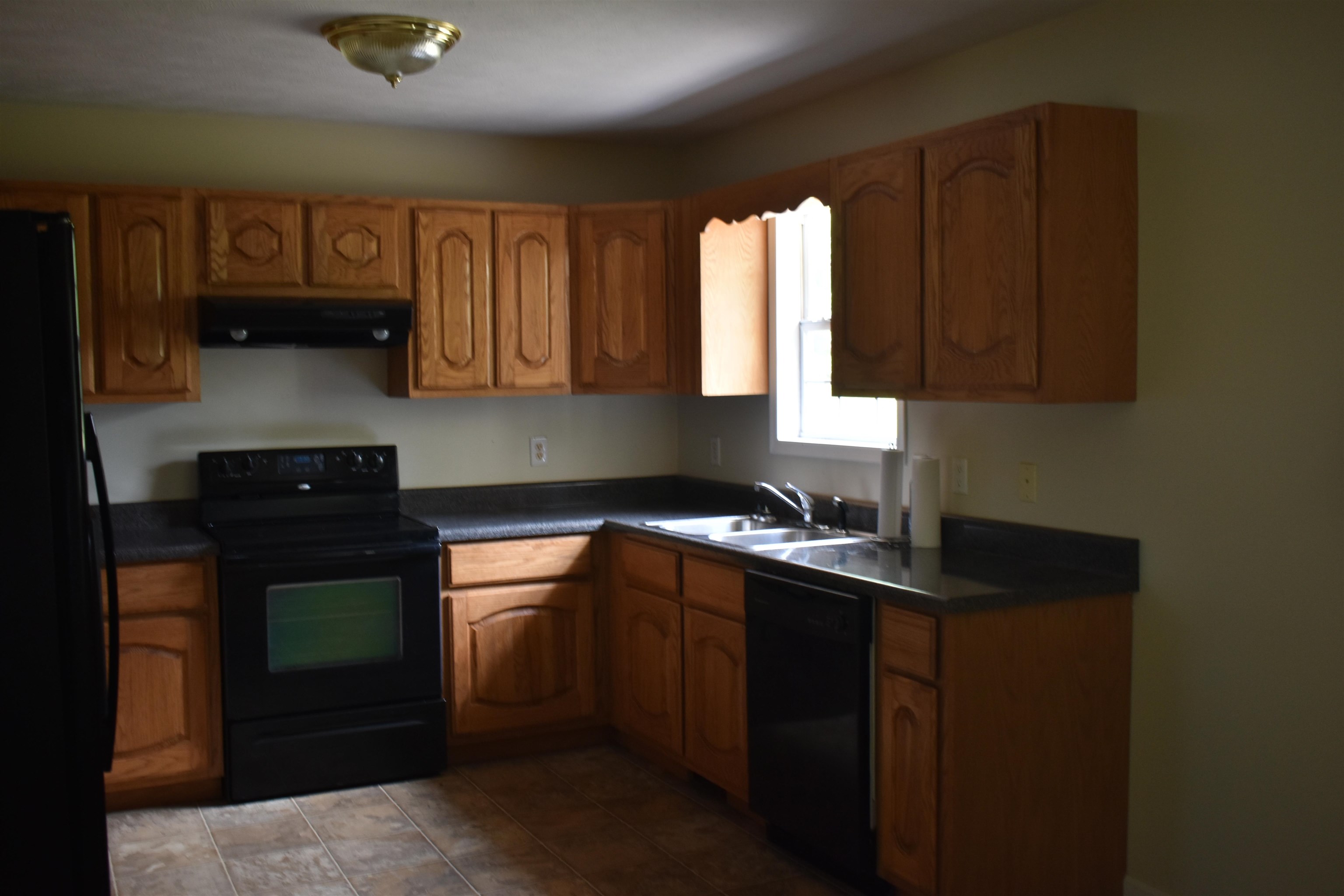 525 57th Highway Ramer, TN 38367 - Photo 8 of 15 a kitchen with a sink cabinets and window