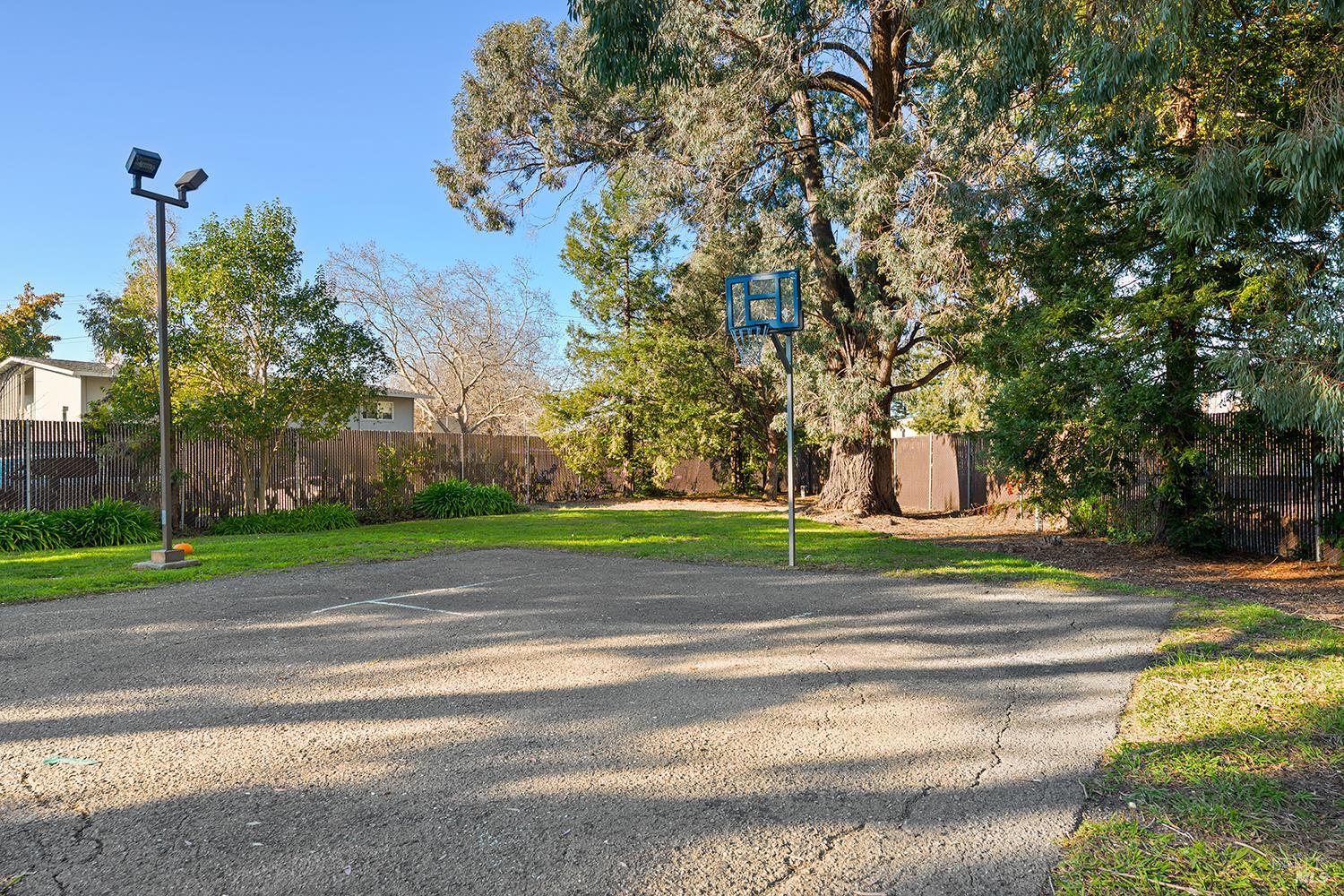 2123 West Steele Lane Santa Rosa, CA 95403 - Photo 24 of 27 Amenities in the complex include a basketball court, maintenance, insurance, grounds, roof, and gutters