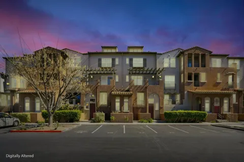 a front view of a multi story residential apartment building