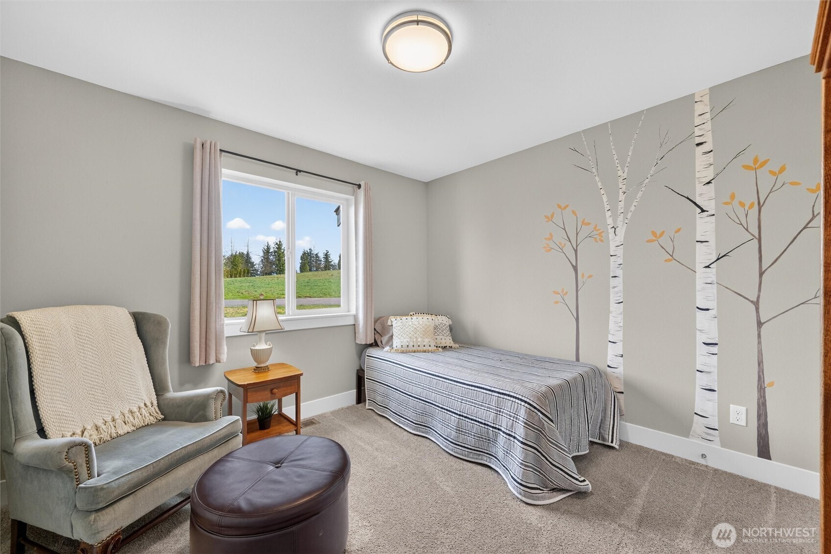 125 Ridgeview Street Sumas, WA 98295 - Photo 24 of 40 a bedroom with a bed and a couch