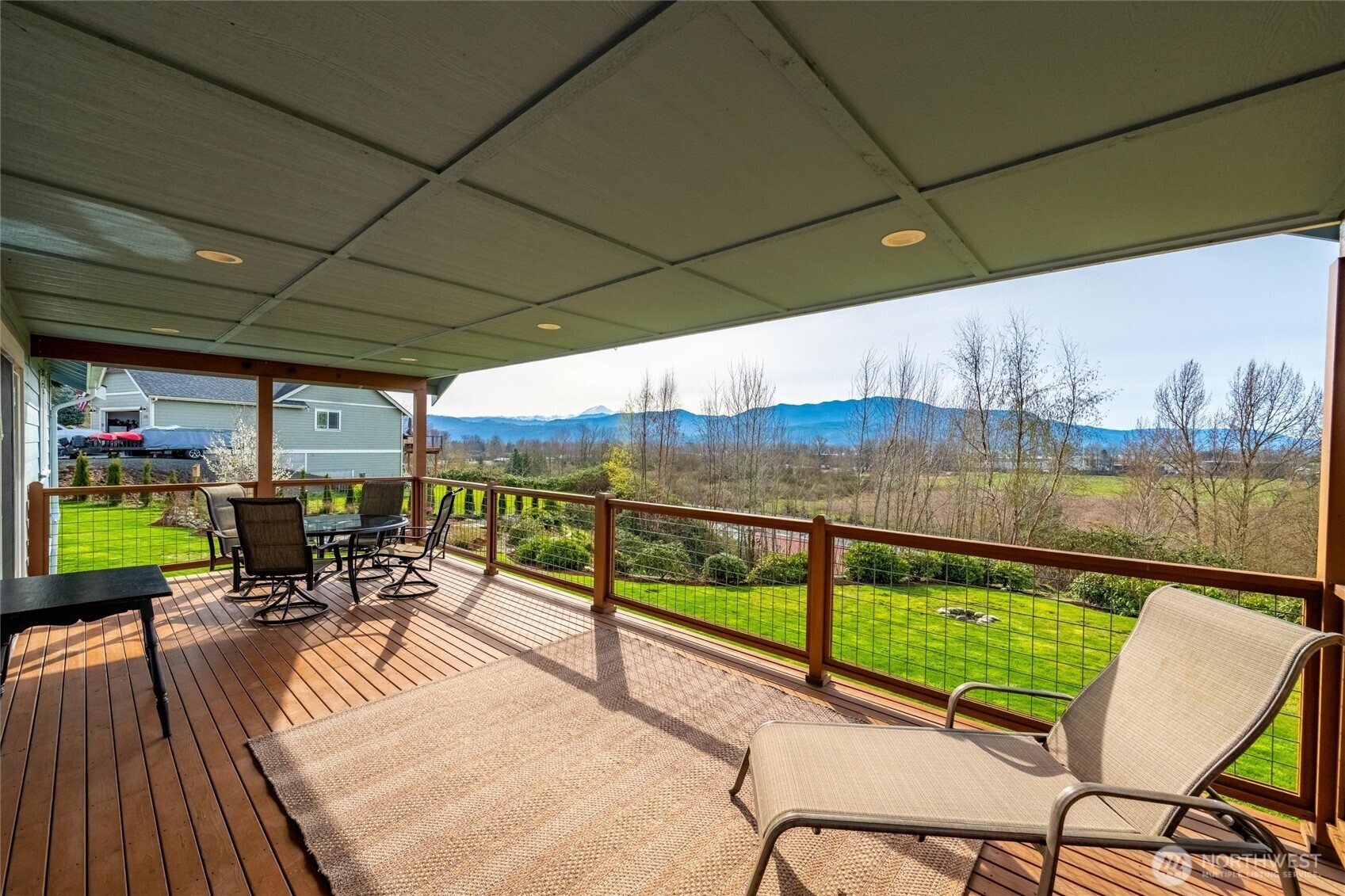 125 Ridgeview Street Sumas, WA 98295 - Photo 27 of 40 a view of a chairs and table in the balcony