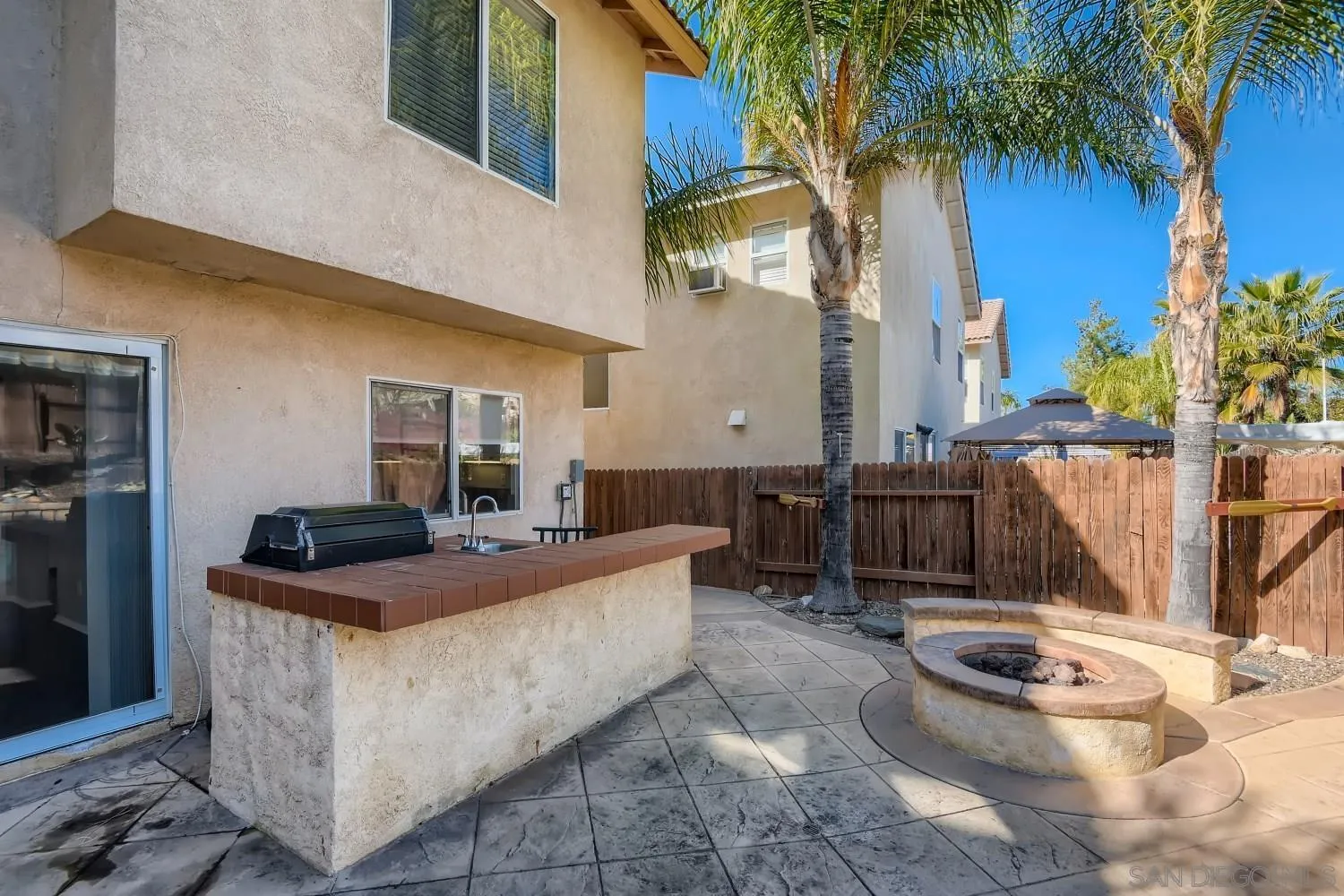39538 Oak Circle Murrieta, CA 92563 - Photo 16 of 27 a living room with furniture and a potted plant