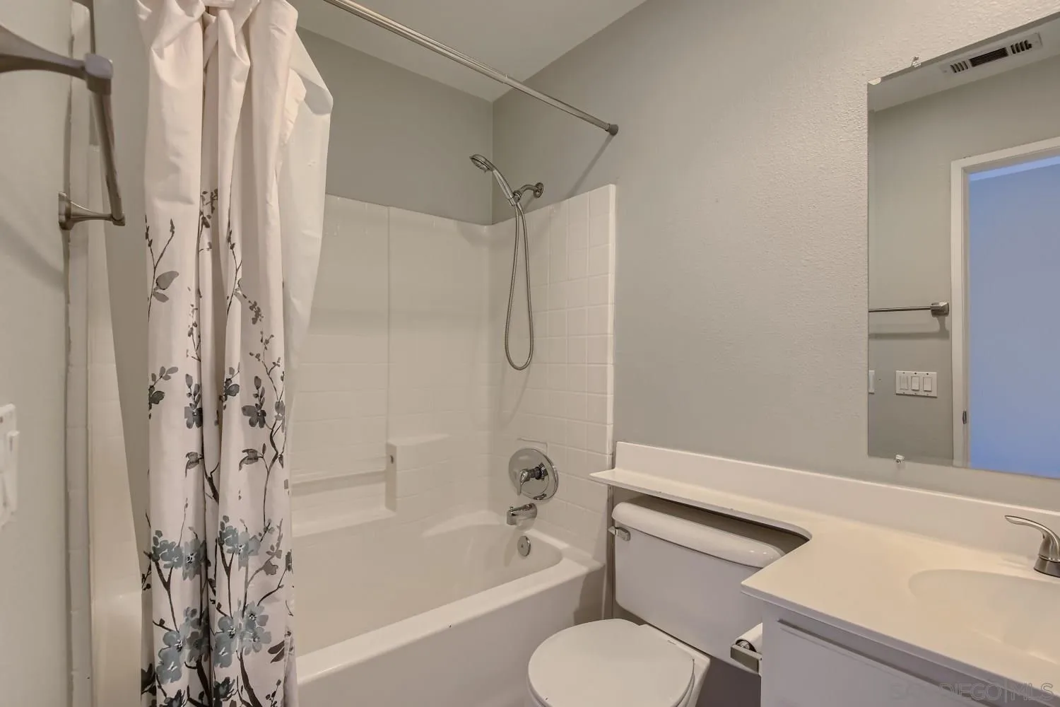 39538 Oak Circle Murrieta, CA 92563 - Photo 23 of 27 a bathroom with a sink toilet and shower