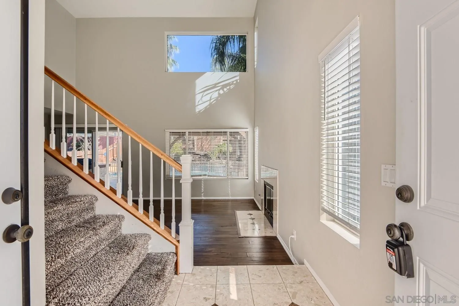 39538 Oak Circle Murrieta, CA 92563 - Photo 5 of 27 a view of a hallway with windows and stairs
