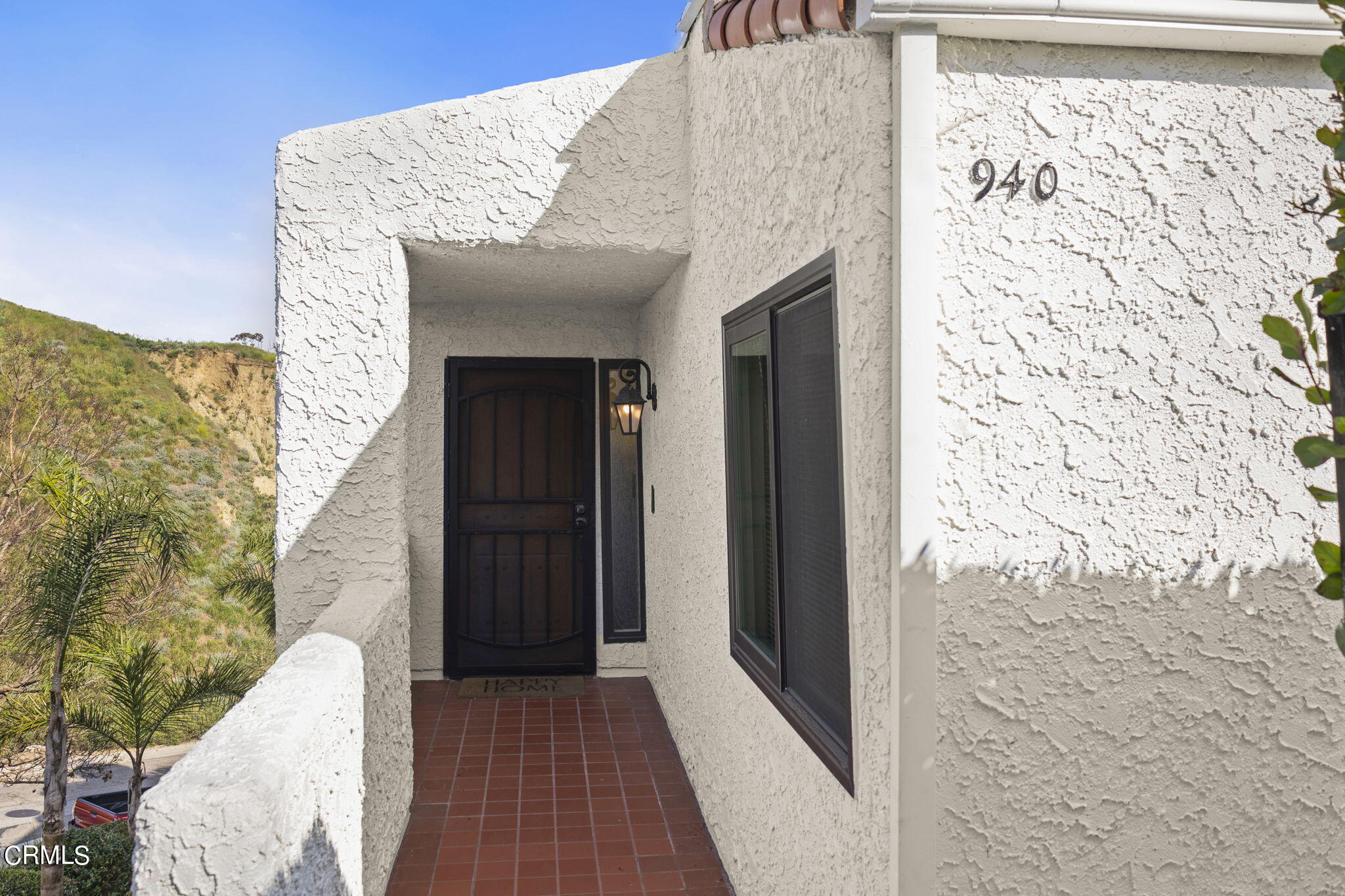 a view of a balcony with a door