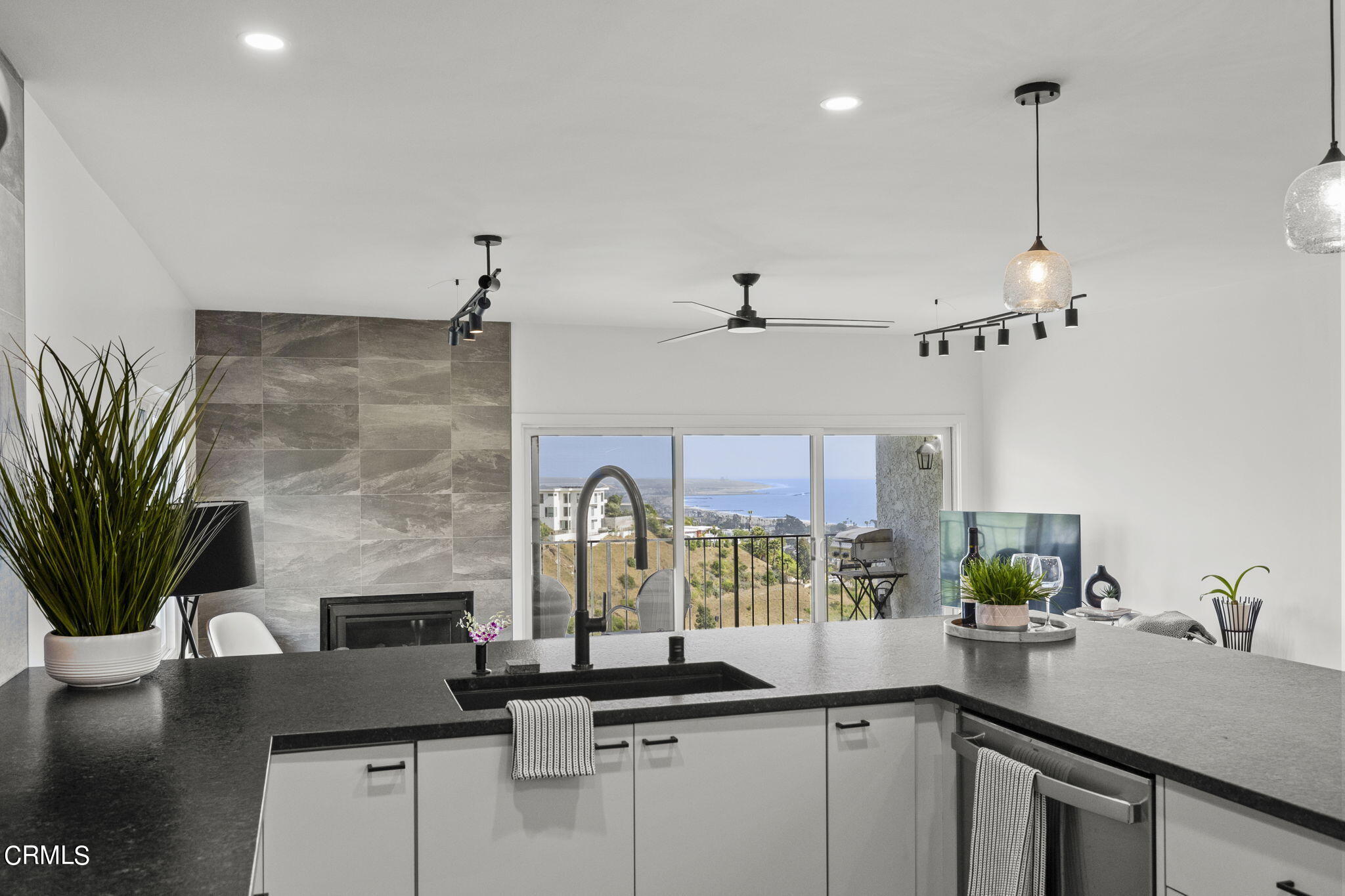 940 Vallecito Drive Ventura, CA 93001 - Photo 13 of 42 a kitchen with a counter space a sink and appliances
