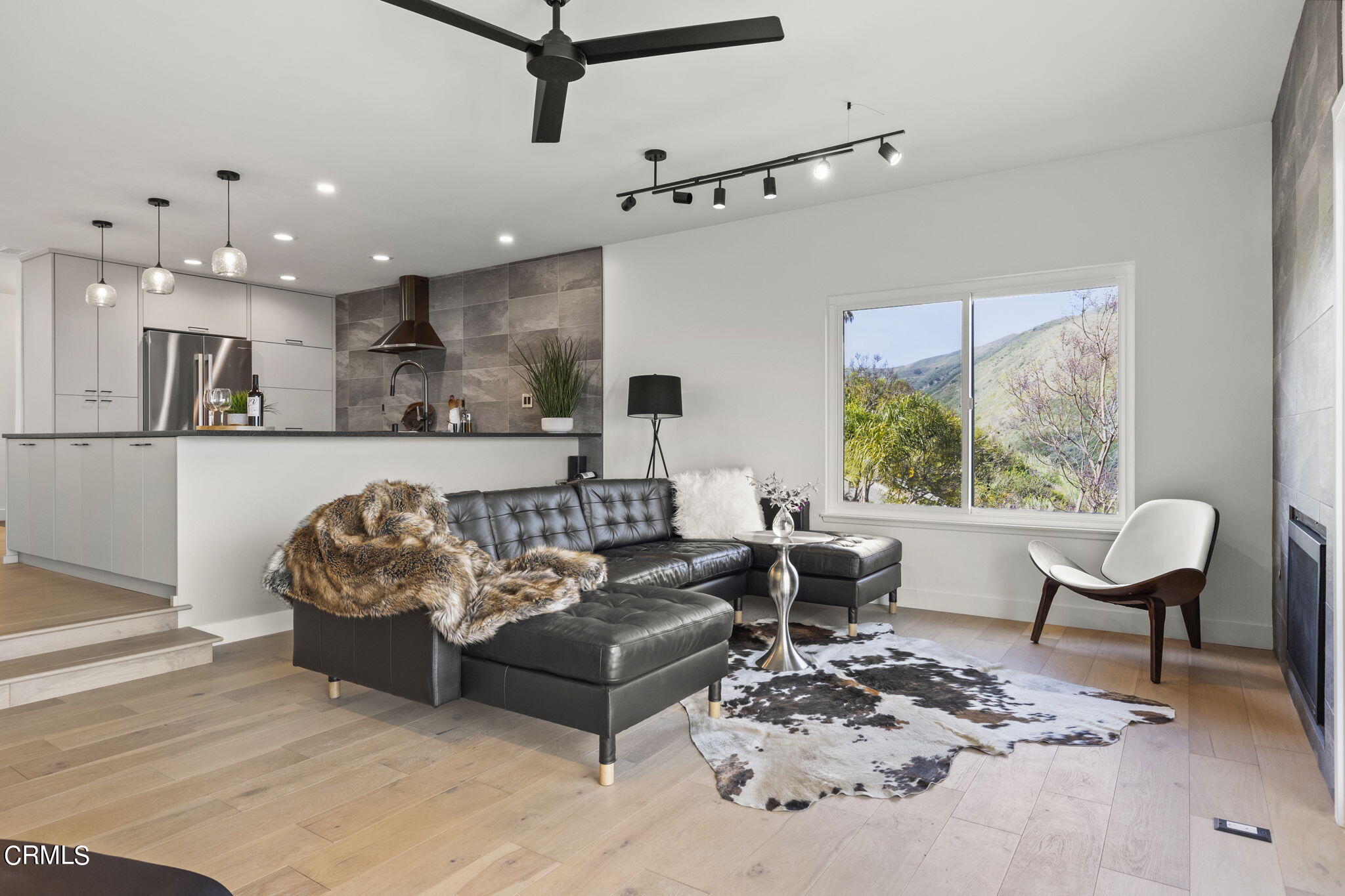 940 Vallecito Drive Ventura, CA 93001 - Photo 15 of 42 a living room with furniture and a large window