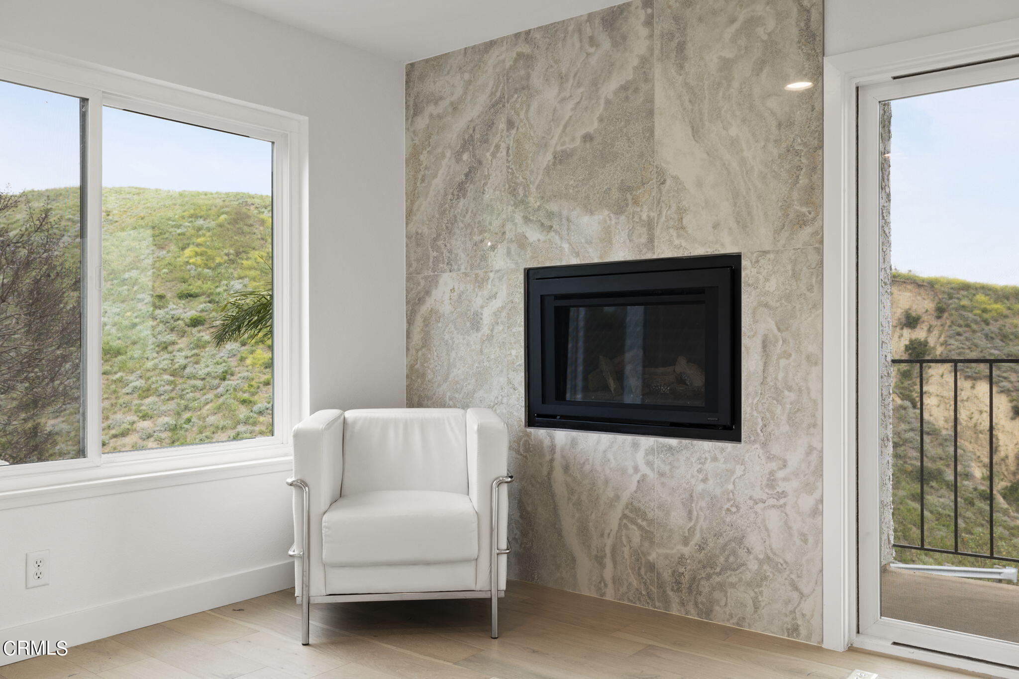 940 Vallecito Drive Ventura, CA 93001 - Photo 25 of 42 a living room with furniture and a fireplace