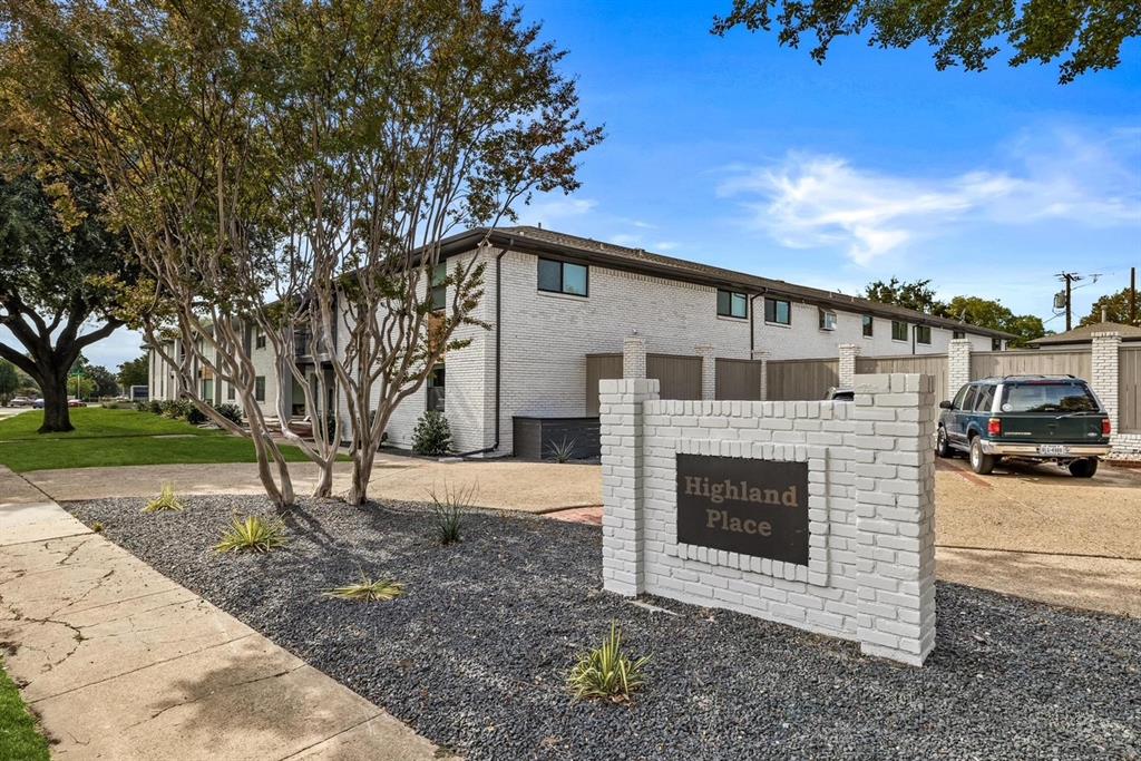 3933 Inwood Road, Unit 1023 Dallas, TX 75209 - Photo 21 of 22 a view of a house with a garden