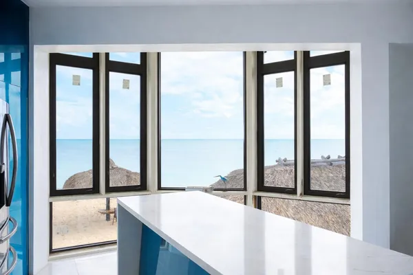 a bathroom with a sink a mirror and a shower