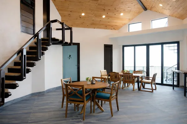 a view of a balcony with wooden floor