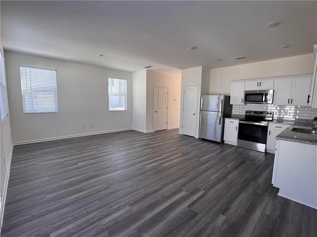 a view of kitchen and microwave
