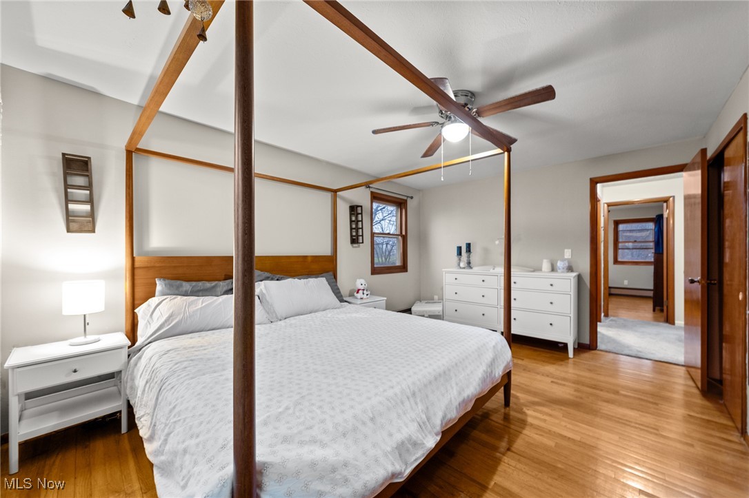 24659 Snell Road Columbia Station, OH 44028 - Photo 19 of 39 Bedroom with ceiling fan and light hardwood / wood-style floors