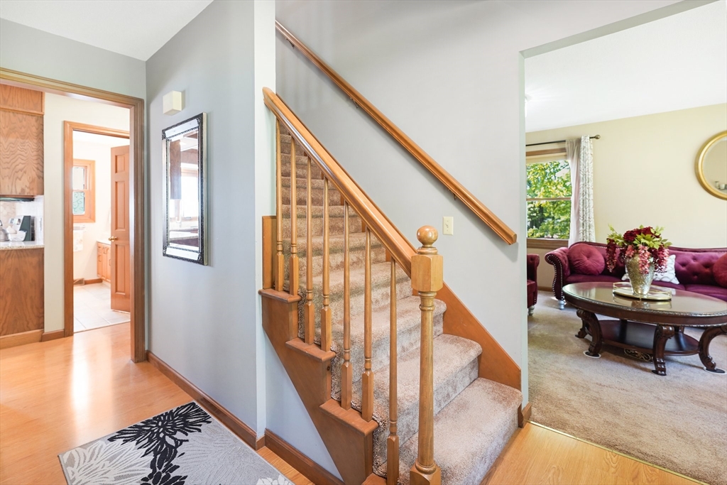 5 Flower Street Springfield, MA 01118 - Photo 12 of 42 a view of entryway and hall with wooden floor