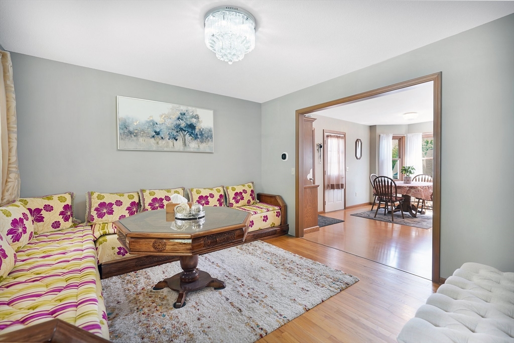5 Flower Street Springfield, MA 01118 - Photo 14 of 42 a living room with furniture and a table