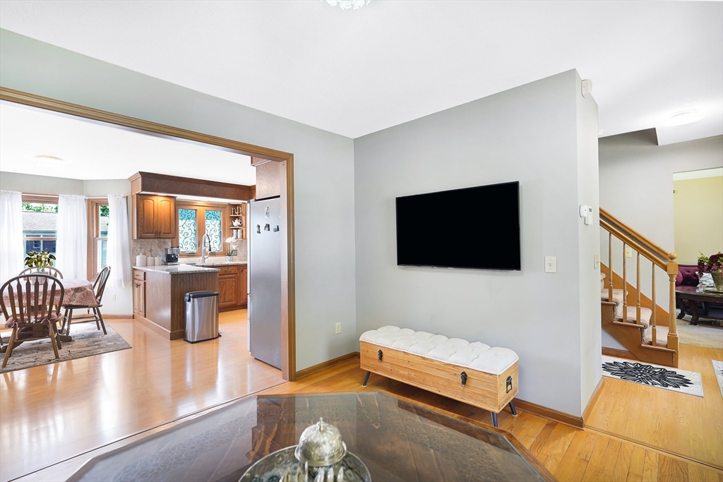 5 Flower Street Springfield, MA 01118 - Photo 16 of 42 a living room with furniture and a flat screen tv