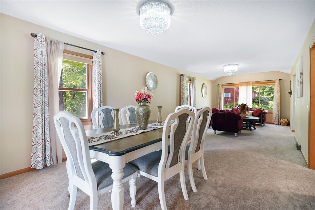 5 Flower Street Springfield, MA 01118 - Photo 25 of 42 a dining room with furniture and a large window