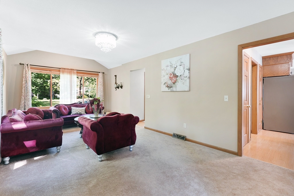 5 Flower Street Springfield, MA 01118 - Photo 26 of 42 a living room with furniture and a window