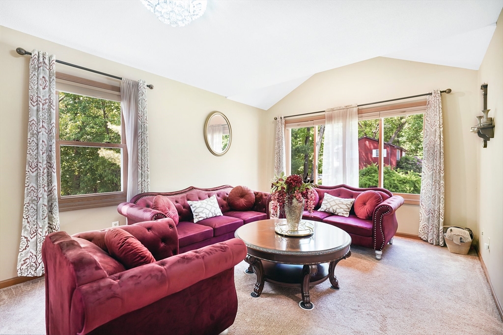 5 Flower Street Springfield, MA 01118 - Photo 27 of 42 a living room with furniture and a large window