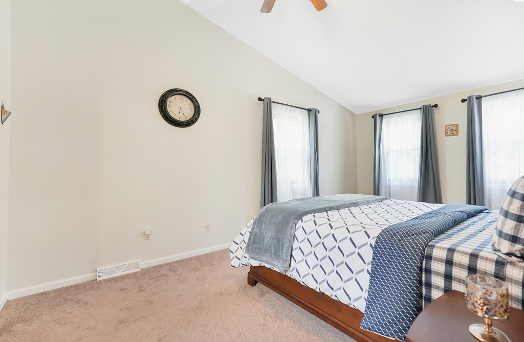 5 Flower Street Springfield, MA 01118 - Photo 32 of 42 a bedroom with a bed and a window