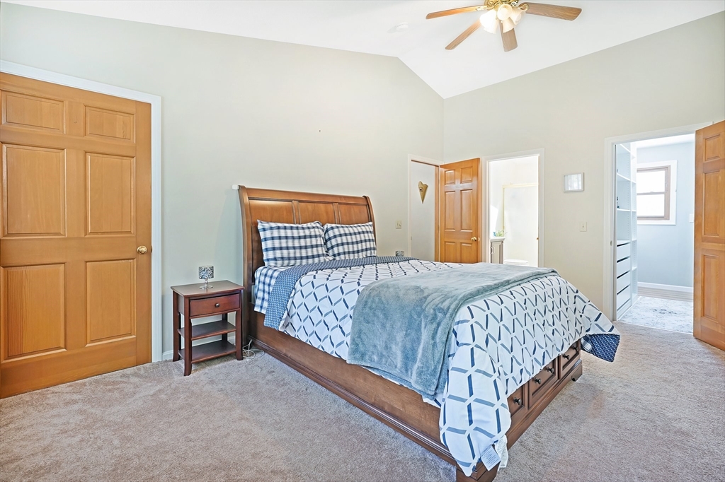 5 Flower Street Springfield, MA 01118 - Photo 33 of 42 a bedroom with a bed and a table