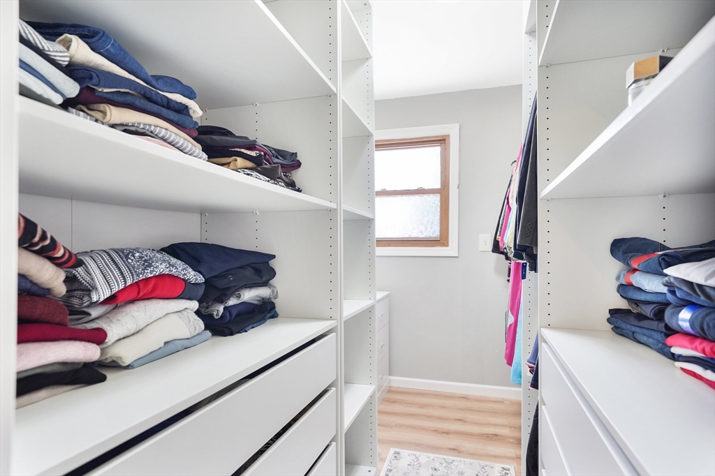5 Flower Street Springfield, MA 01118 - Photo 34 of 42 a bedroom with a bed and a window
