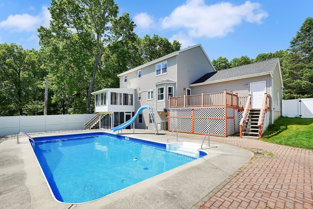 5 Flower Street Springfield, MA 01118 - Photo 7 of 42 a view of a house with pool