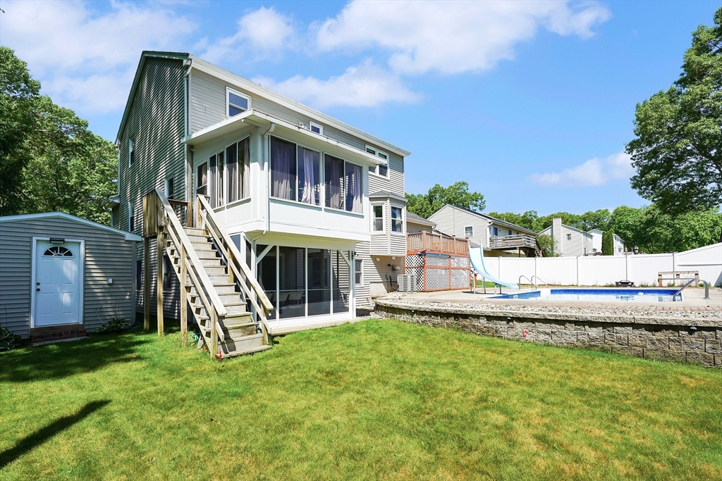 5 Flower Street Springfield, MA 01118 - Photo 8 of 42 a view of a house with a yard
