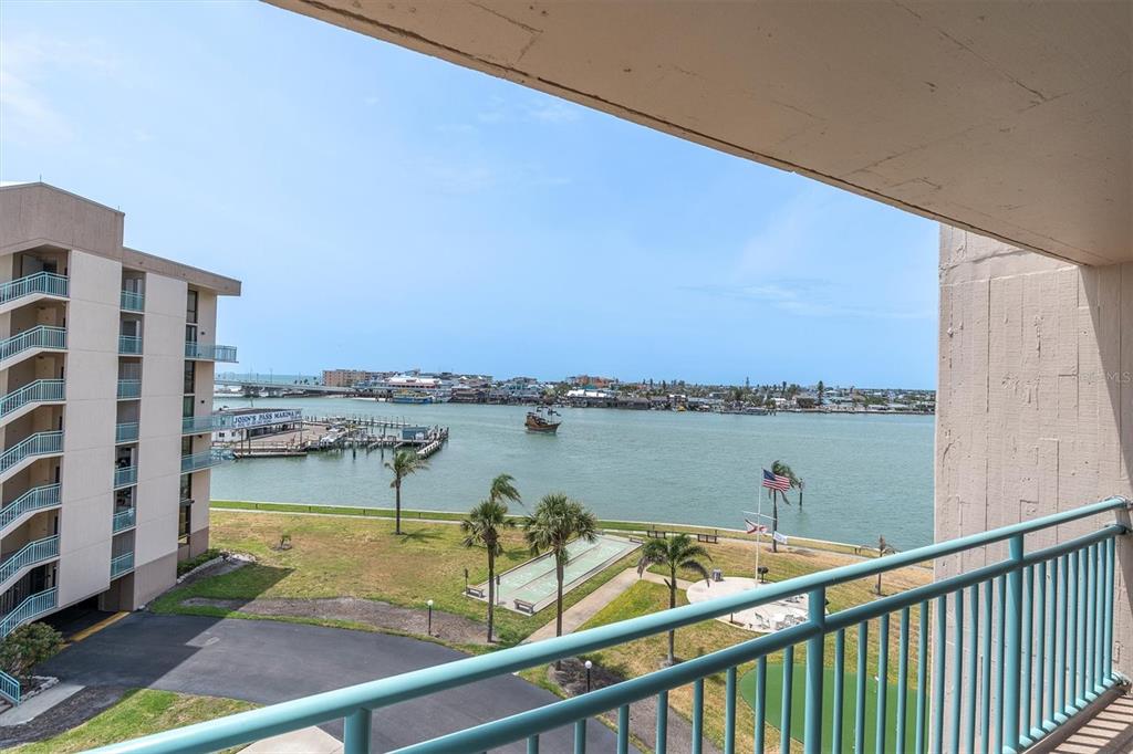 1 Key Capri, Unit 502E Treasure Island, FL 33706 - Photo 25 of 51 a view of a lake from a balcony