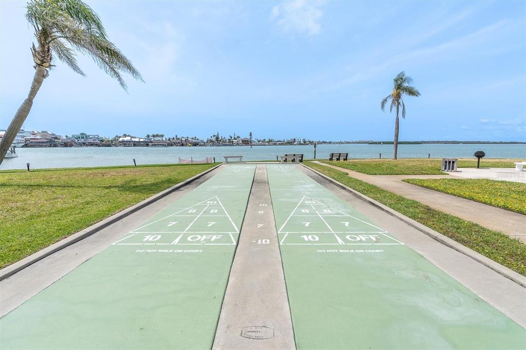 1 Key Capri, Unit 502E Treasure Island, FL 33706 - Photo 35 of 51 a view of a swimming pool with a lake view