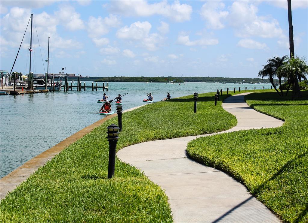 1 Key Capri, Unit 502E Treasure Island, FL 33706 - Photo 37 of 51 a view of a lake with houses in the back