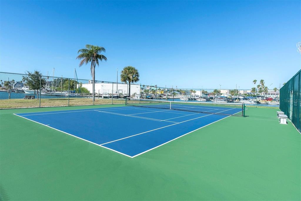 1 Key Capri, Unit 502E Treasure Island, FL 33706 - Photo 40 of 51 a view of an outdoor space and tennis court
