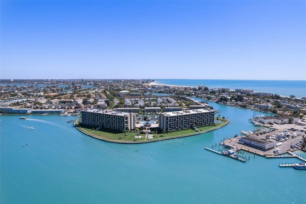 1 Key Capri, Unit 502E Treasure Island, FL 33706 - Photo 48 of 51 an aerial view of a house with a ocean view