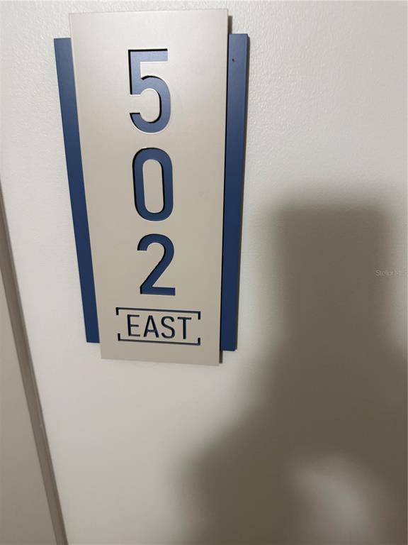 1 Key Capri, Unit 502E Treasure Island, FL 33706 - Photo 5 of 51 a close up of a street sign