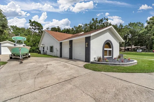 a bedroom with a large bed and a flat screen tv