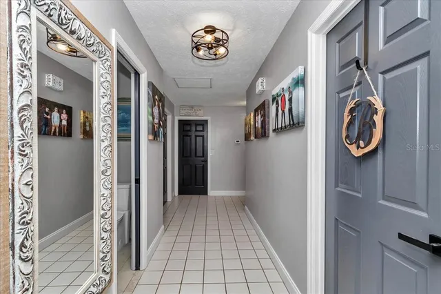 a large bathroom with a sink a large mirror and a shower