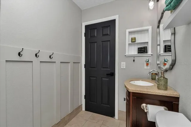 a view of house with backyard