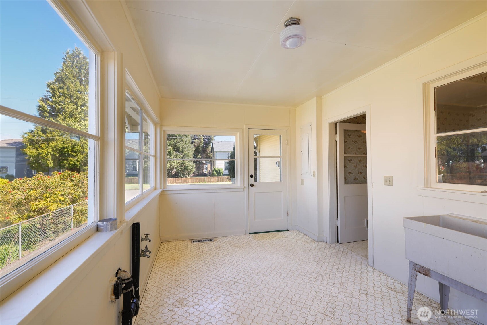 1320 4th Street Cosmopolis, WA 98537 - Photo 17 of 40 a view of an empty room with a window