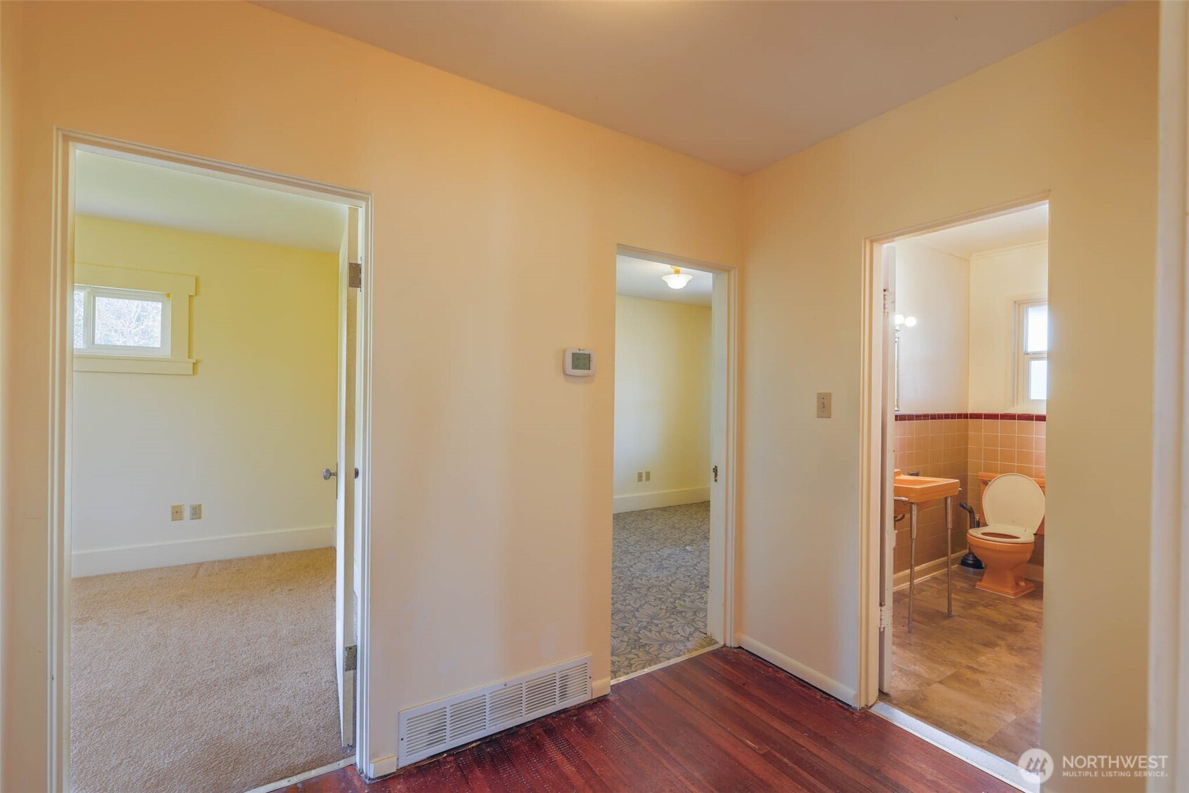 1320 4th Street Cosmopolis, WA 98537 - Photo 18 of 40 a view of a bathroom with a glass door and a bathroom