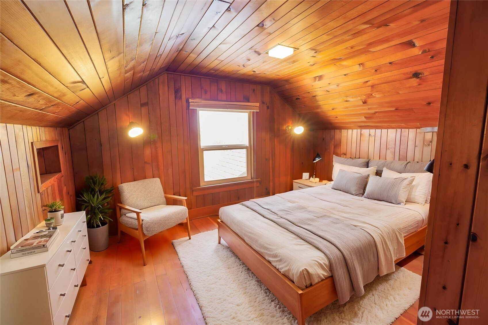 1320 4th Street Cosmopolis, WA 98537 - Photo 31 of 40 a spacious bedroom with a bed and large windows