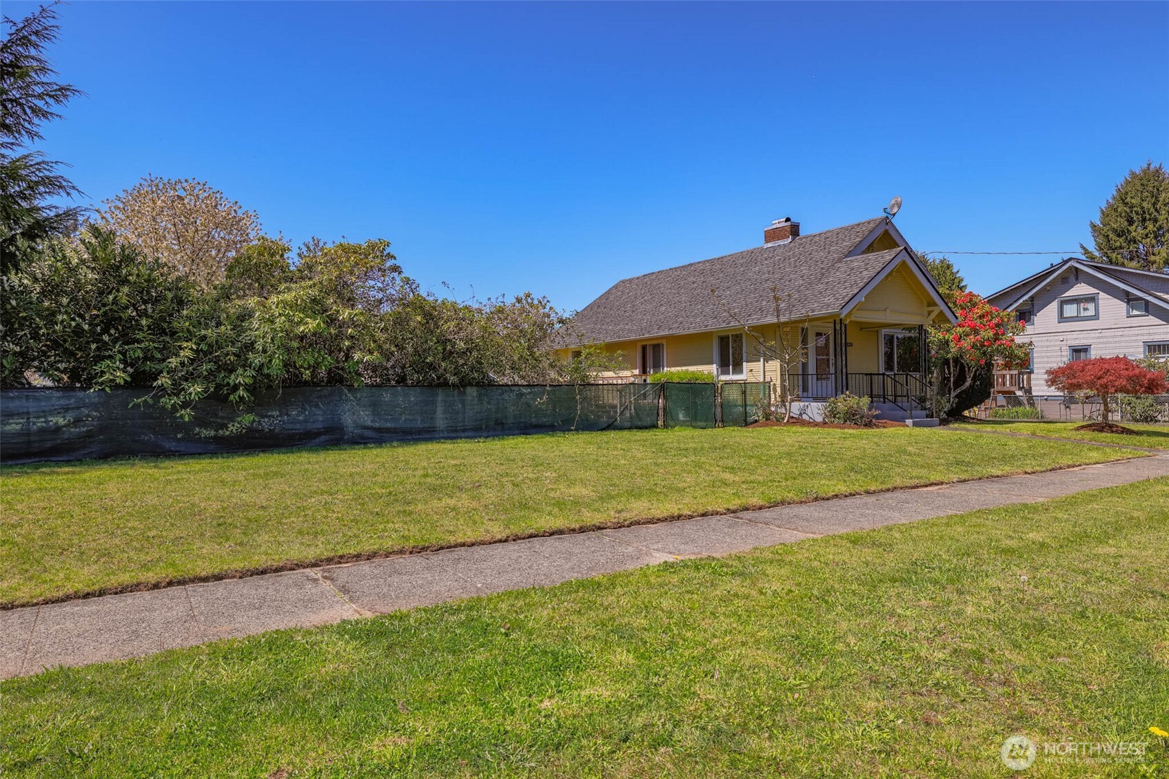 1320 4th Street Cosmopolis, WA 98537 - Photo 34 of 40 a front view of a house with garden
