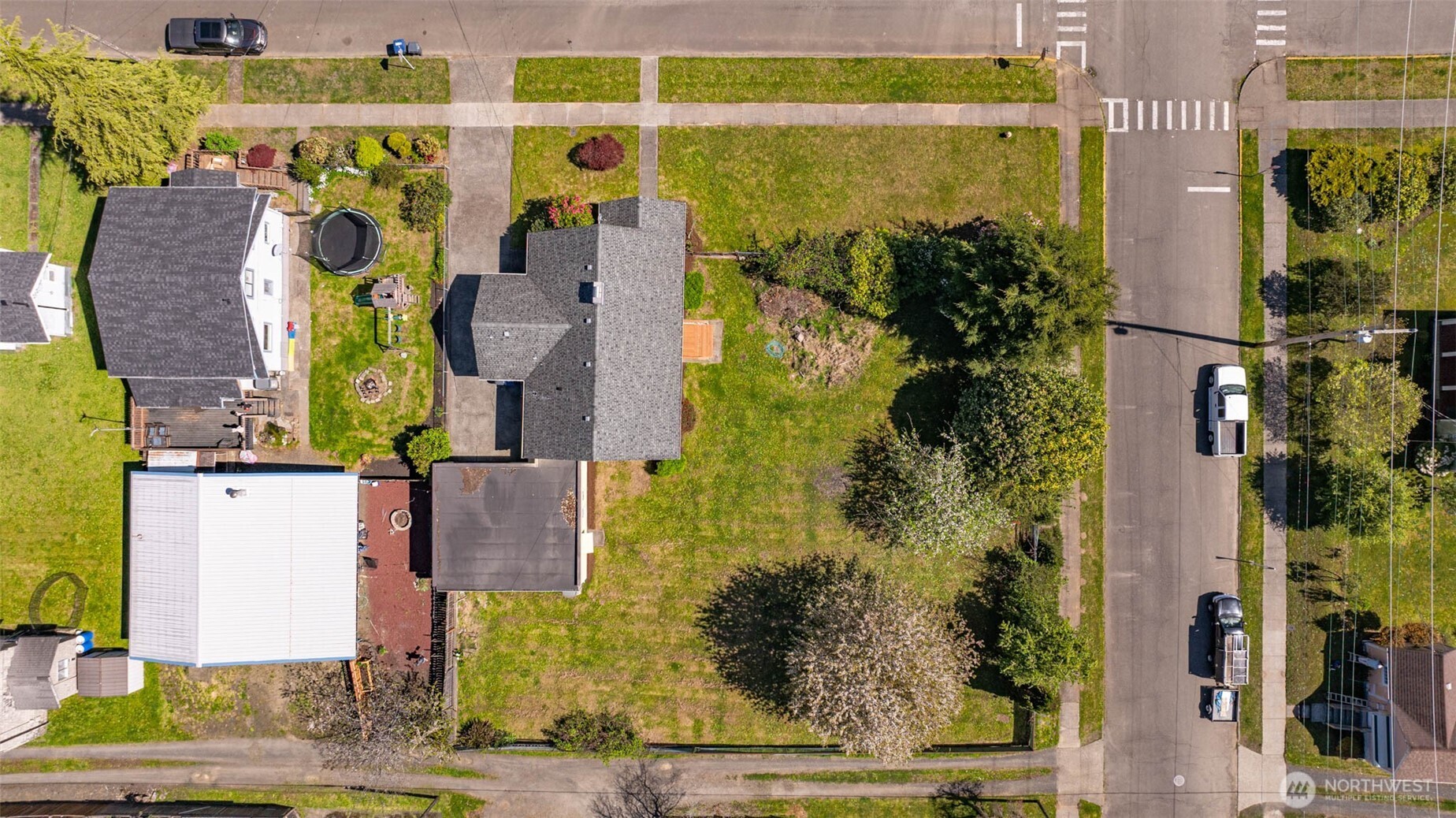 1320 4th Street Cosmopolis, WA 98537 - Photo 38 of 40 an aerial view of residential house with outdoor space and swimming pool